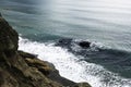 Sea Ã¢â¬â¹Ã¢â¬â¹wave washes yellow beach of pebbles